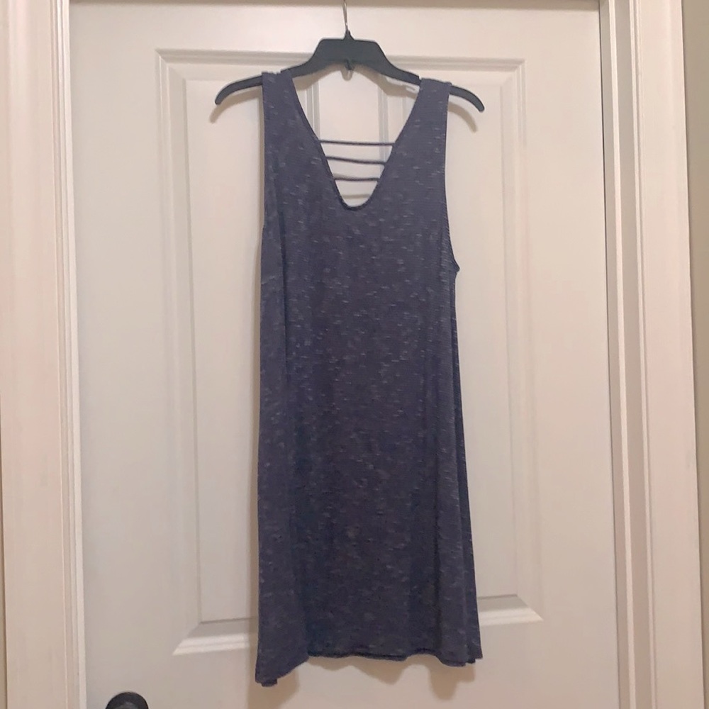 This is a casual summer dress from the brand Allison Jay’s and fits like a large